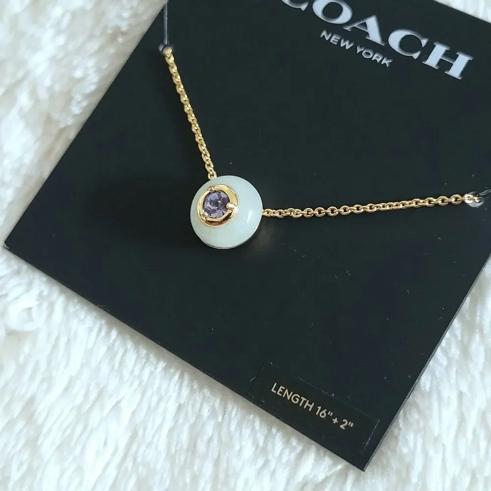 Coach Gold💛 Raised Slider Disc📀 Pendant Necklace
